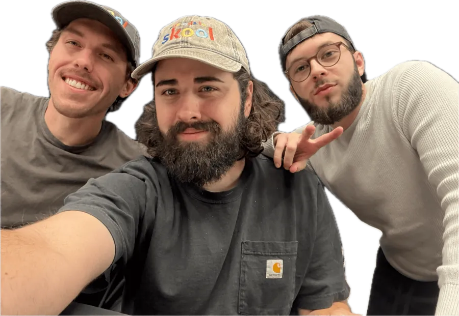 The three people behind Booked Out Roofers, a candid photo of the small team.
